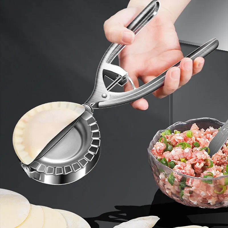 Silver stainless steel kitchen dumpling mould with handle for manual pressing