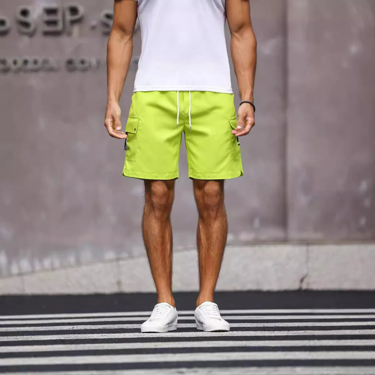 Men's loose fit workwear shorts in cool silk cotton fabric available in fluorescent green and army green colours