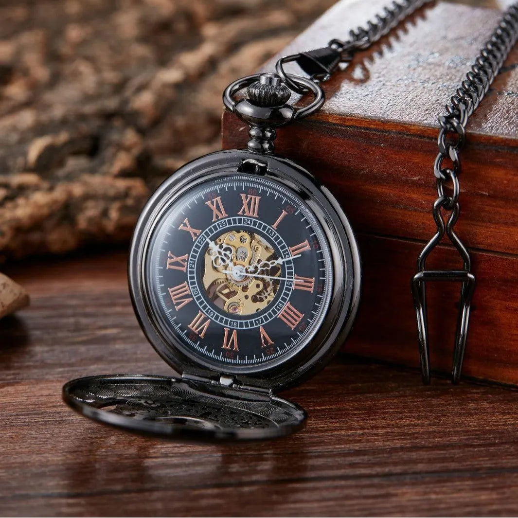 Retro mechanical pocket watch with hollow floral dial and transparent case back showing internal mechanism