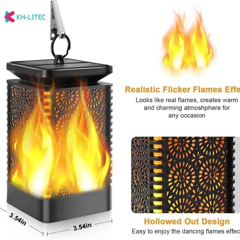 Four black solar-powered outdoor torch lights with flickering LED flame effect, placed on a garden patio.