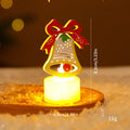 Assorted LED electronic candles featuring Christmas tree, Santa Claus, and snowman designs on a table