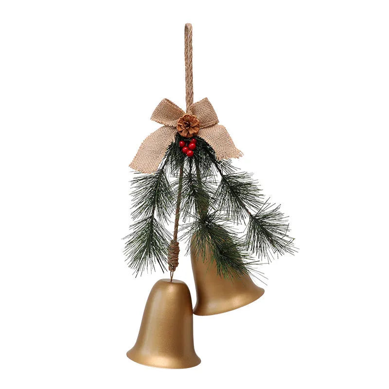 Red velvet bow bell pendant with gold bell accents on a white background