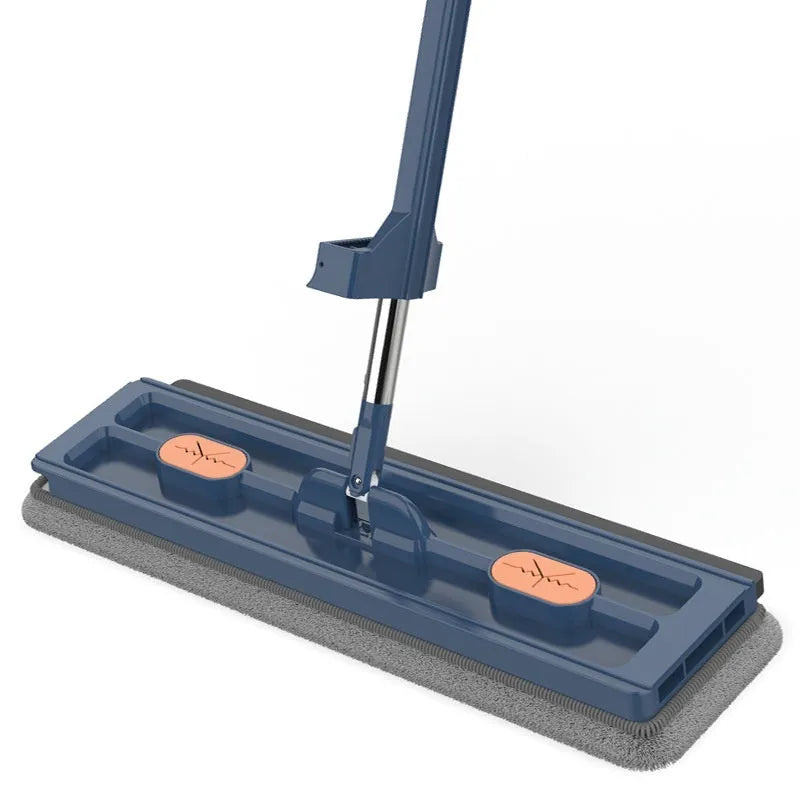 Large blue flat mop with a long silver handle showing the rotating head and built-in dewatering scraper.