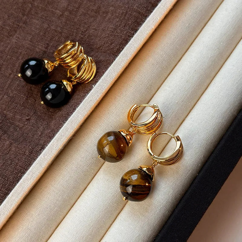Gold-plated tigereye stone earrings with geometric round shape in French retro style