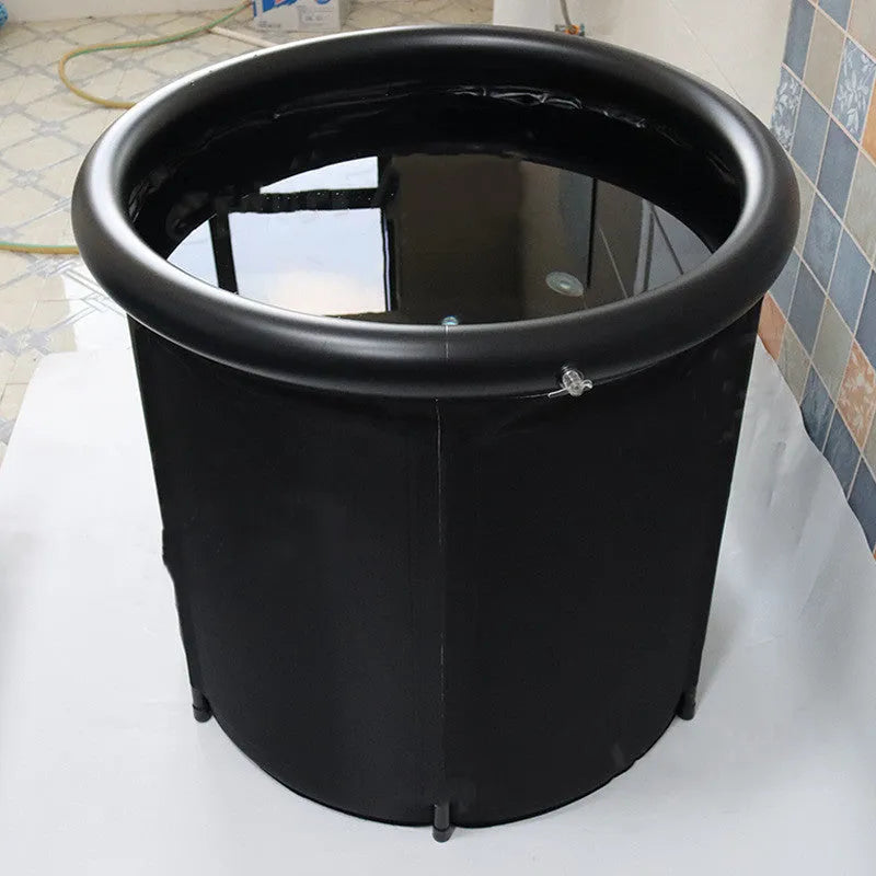 Black inflatable PVC portable ice bath tub with insulation and a fitted weather lid.