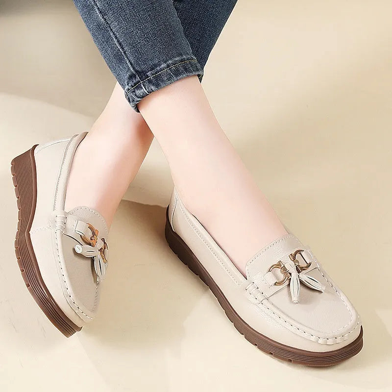 Women's plus size flat moccasins loafers with tassels, round toe, low wedge heel, solid colour suede upper, slip-on style in beige, gray, and pink