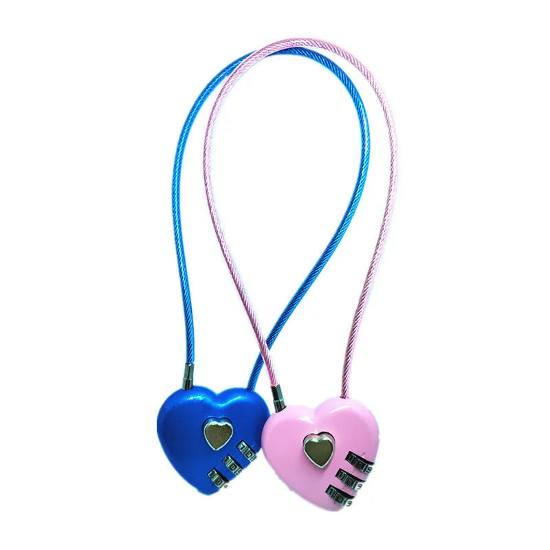 Peach heart shaped combination lock with a long black steel cable, shown in blue plastic.