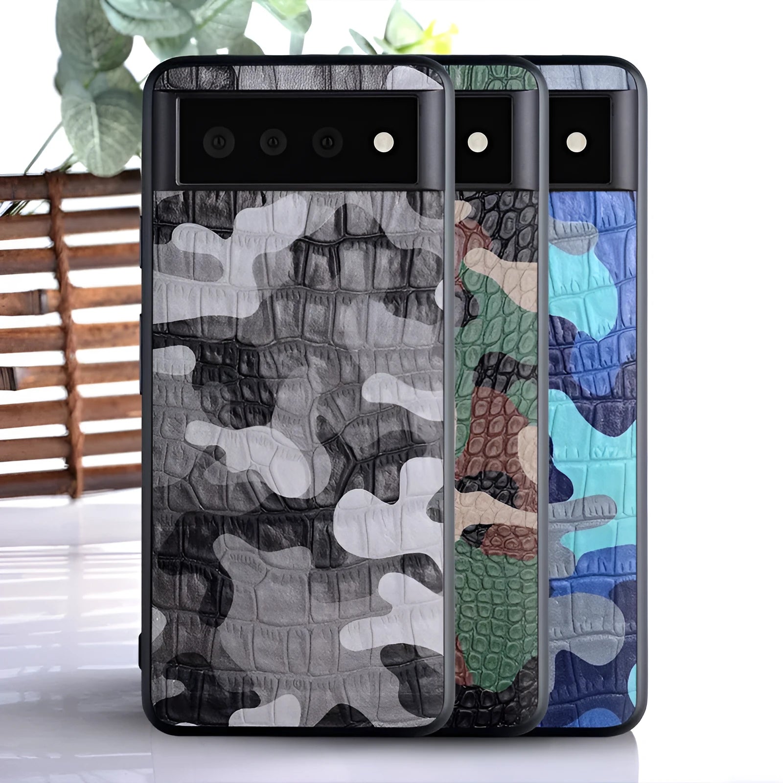 Camouflage PU phone case for Google Pixel, showing pattern and colour options of green, gray, blue, orange
