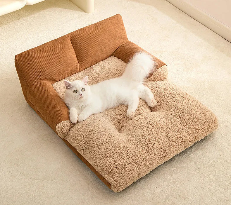 Grey pet nest cushion mat for small dog, shown in medium size with dimensions 58cm long by 43cm wide.