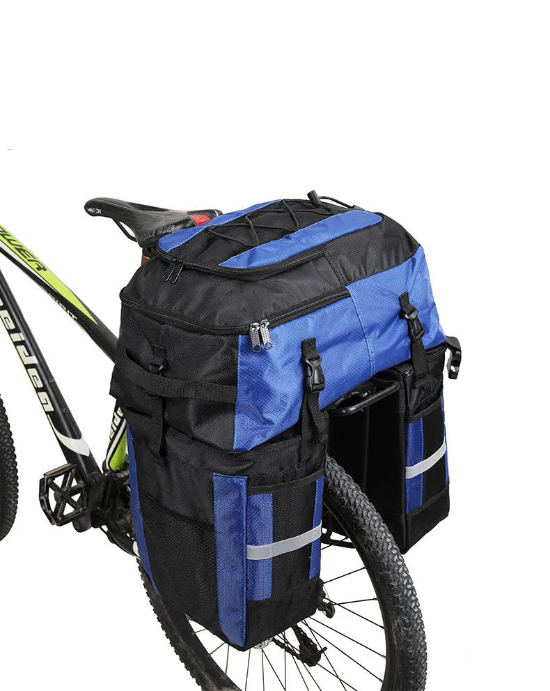 Rhinoceros 70-litre green bicycle rear storage bag mounted on a bike rack for touring.