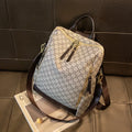 Large capacity retro crossbody backpack with floral print in brown, waterproof PVC material, anti-theft design for travel