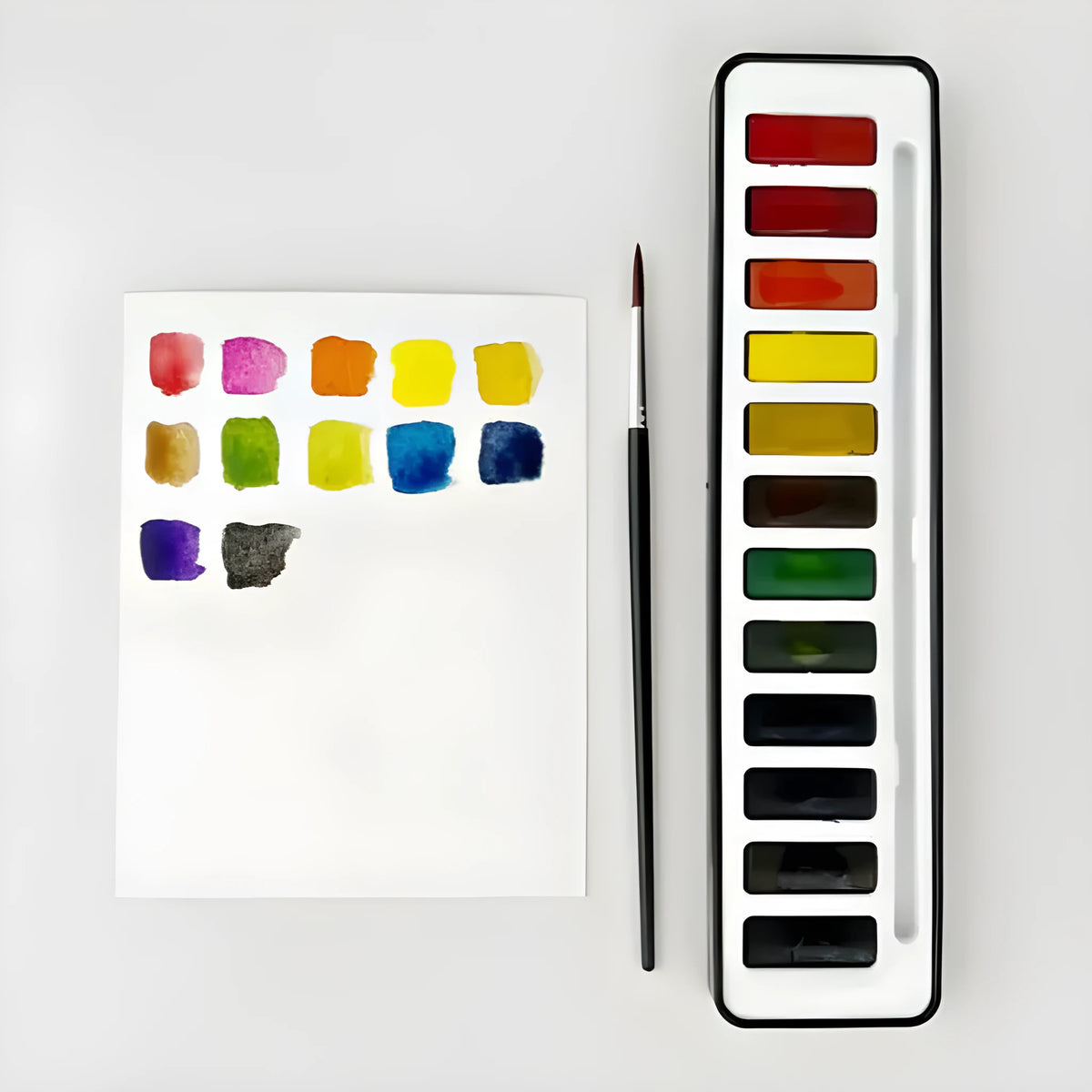 Portable paint box with twelve natural pigment colours arranged in a fashionable palette