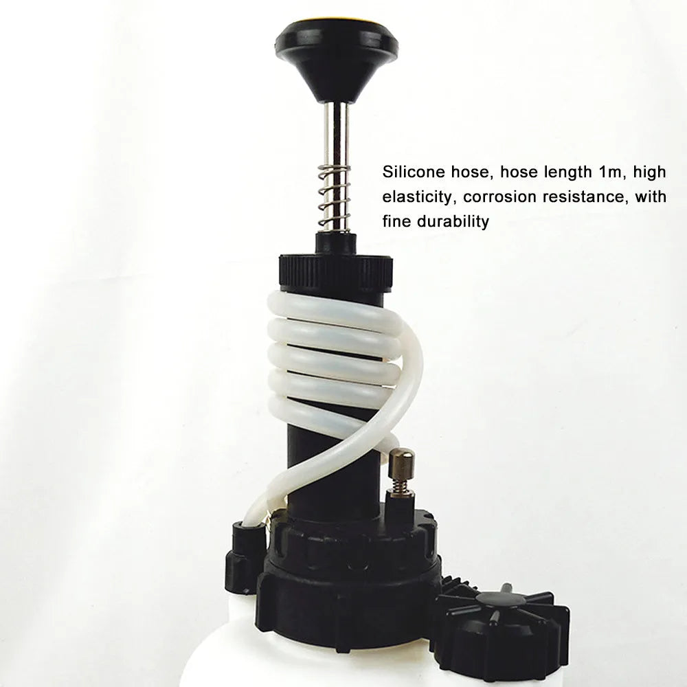 White 3-litre plastic brake fluid tank with copper and iron pump fittings for automotive service.