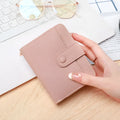 Ladies' short wallet with lychee pattern in pu leather, showing 2-fold compact design
