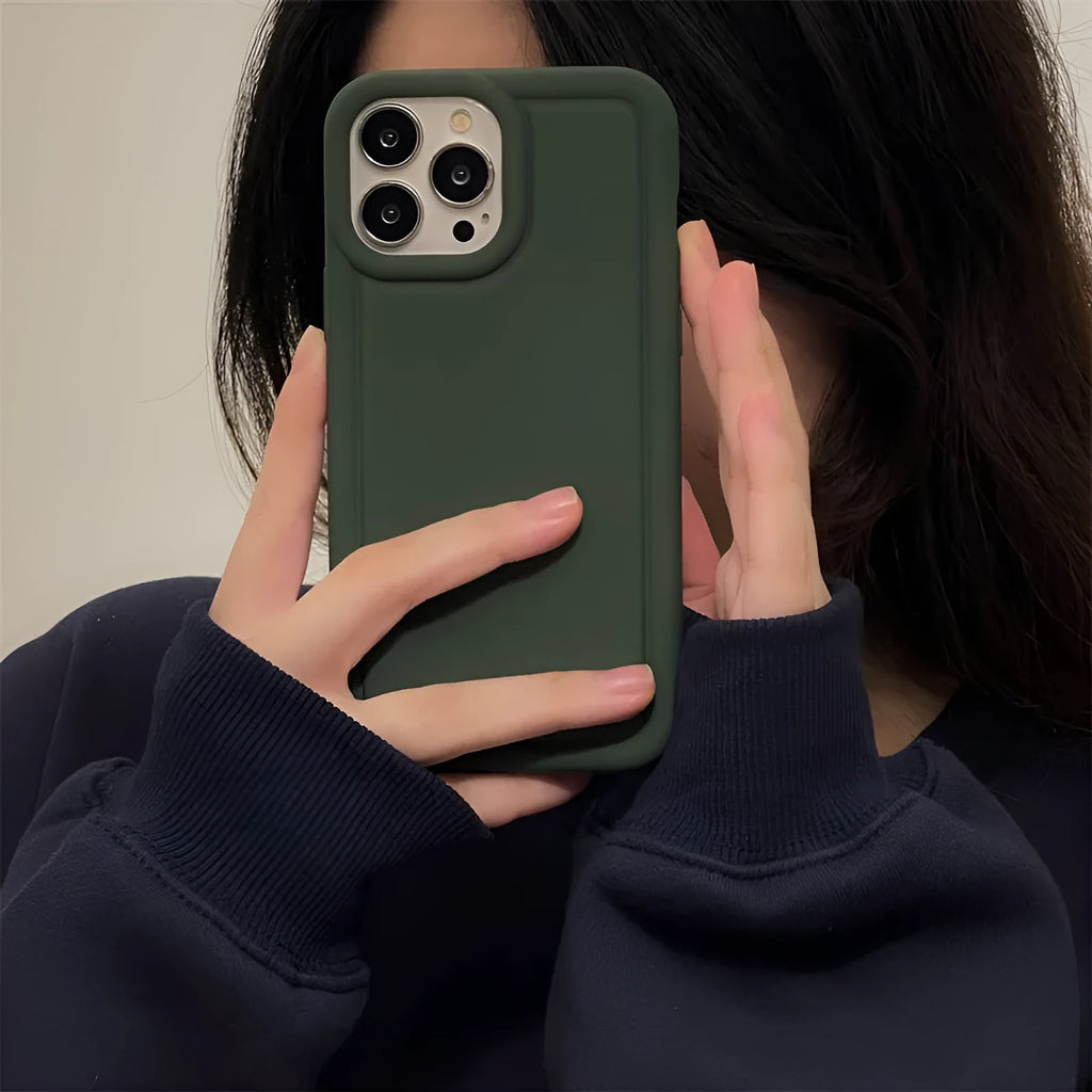 Silicone soft phone case for iPhone in black, showing rear cutout for camera and side buttons