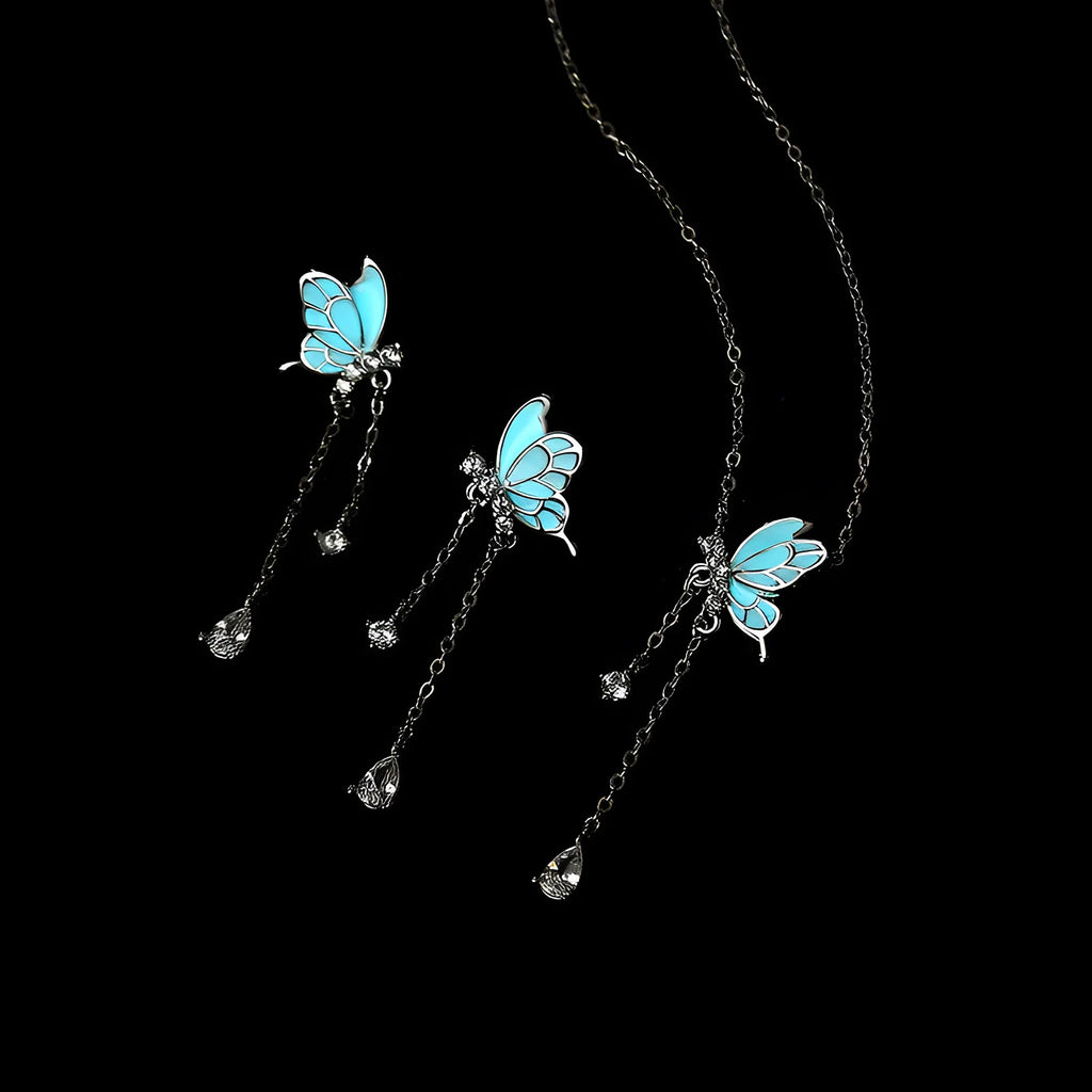 925 sterling silver butterfly tassel noctilucent necklace with O-ring chain on model, luminous pendant visible in low light