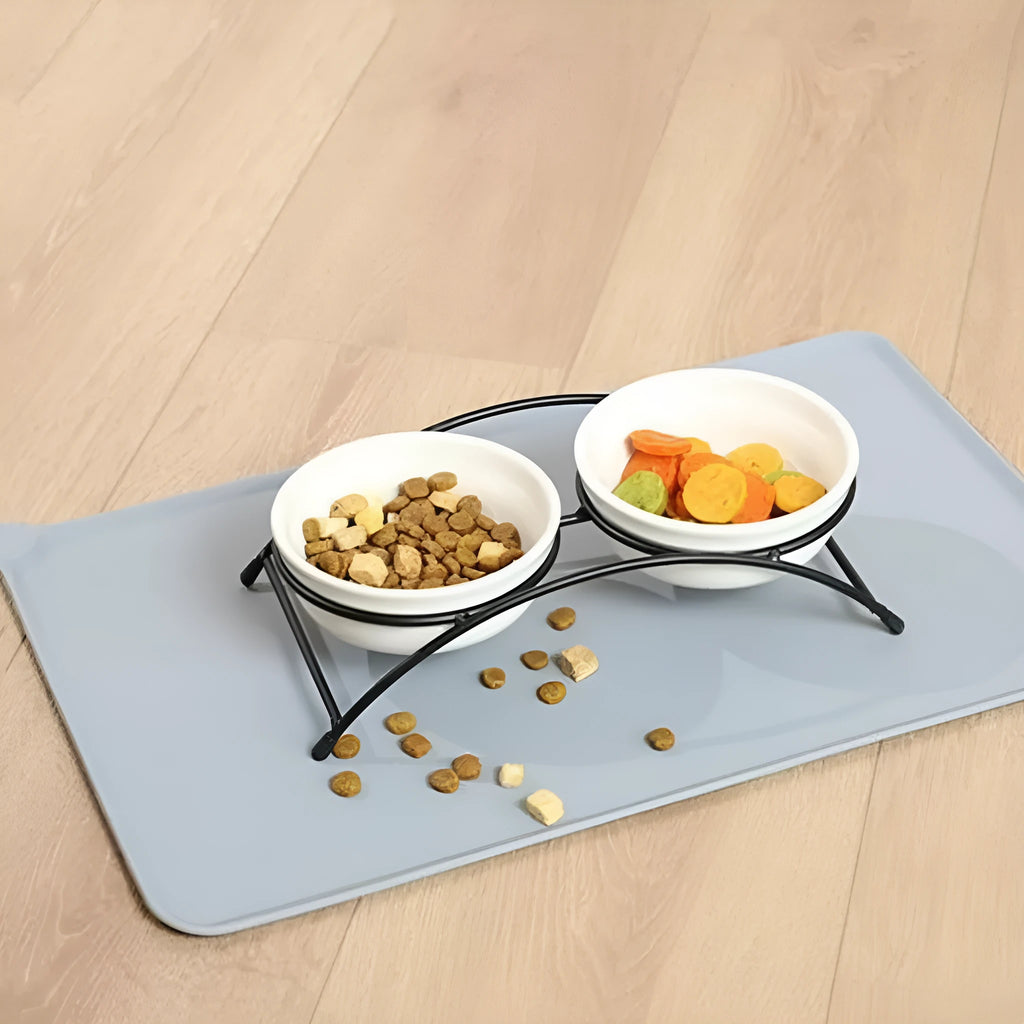 Silicone pet feeding placemat under a dog bowl, shown in one of five available colours.