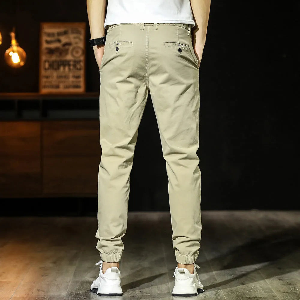 Men's khaki cotton tapered casual pants with ankle ties, mid waist and zipper fly, size 32