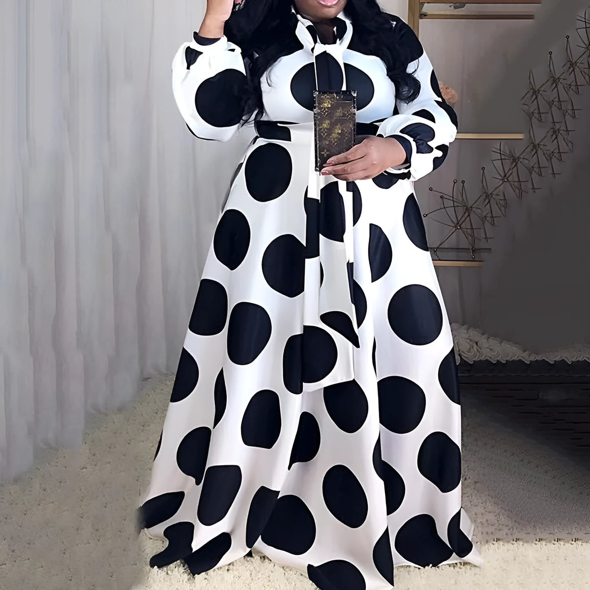 Women's large size white polka dot dress with long sleeves and long skirt, front view
