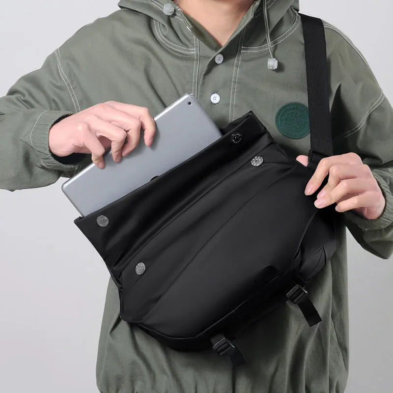 Grey PU leather crossbody bag for men showing front zipper and adjustable shoulder strap
