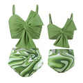 Women's bikini swim set with big bow design on nylon swim trunks in multiple colour options