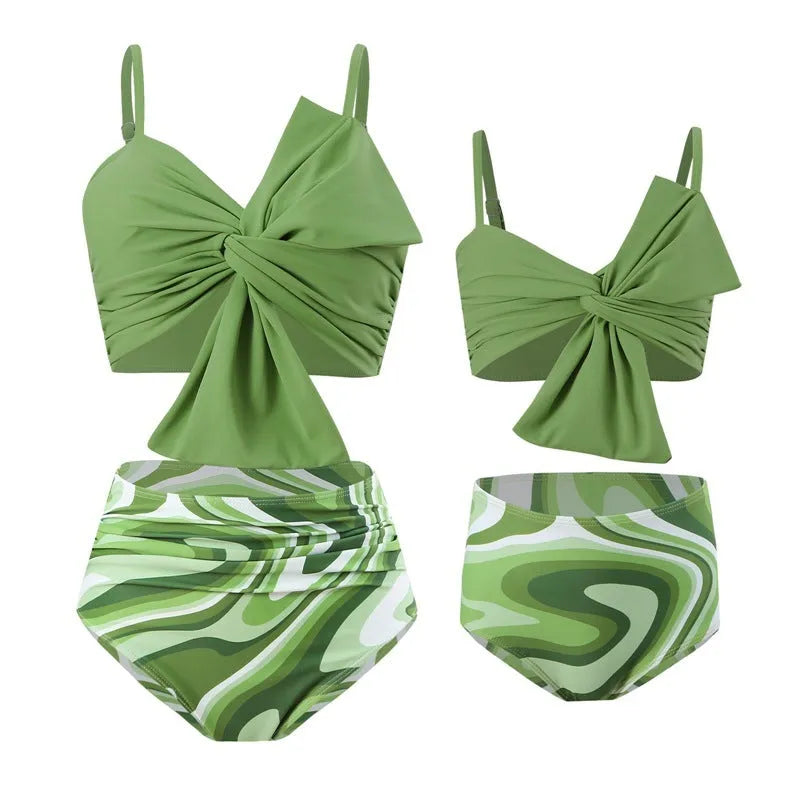 Women's bikini swim set with big bow design on nylon swim trunks in multiple colour options