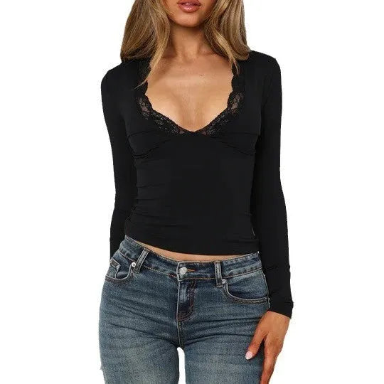 Women's black slim-fit pullover top with lace floral detailing and long sleeves