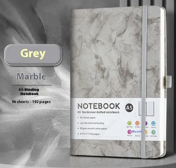A5 and A6 size notebooks with soft skin-feel PU leather covers and a strap, shown in various colours next to open pages with horizontal ruled lines.