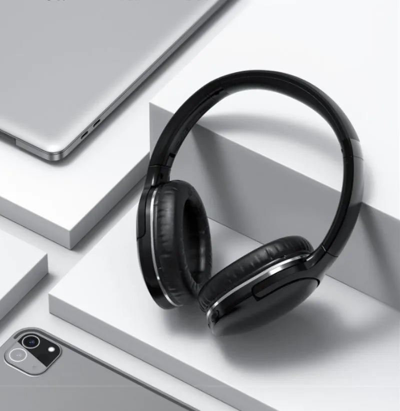 Black and white wireless Bluetooth sports gaming headset with subwoofer shown from the side.