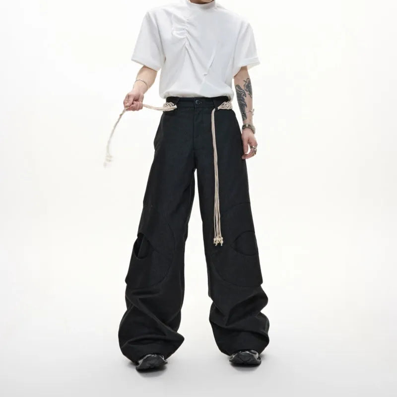 Men's dark blue straight-leg cotton jeans with heavy 3D belt stitching and zip decoration.