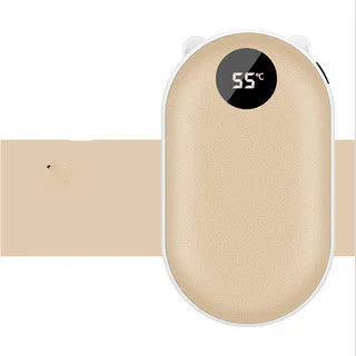 Compact rechargeable hand warmer and power bank in rose gold finish showing size relative to a hand.