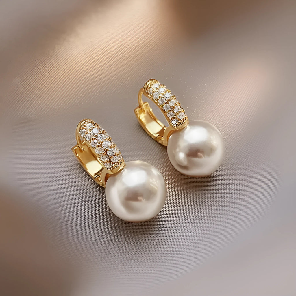 Women's geometric pearl stud earrings made of alloy with electroplating finish