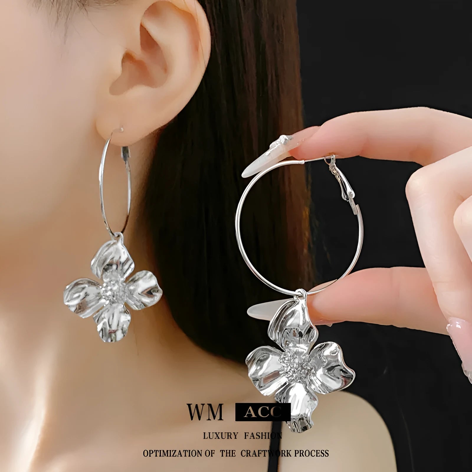 Geometric flower-shaped alloy earrings with a gold or silver electroplated finish.