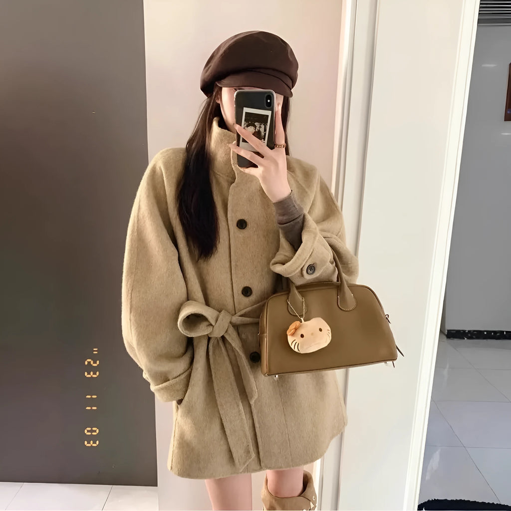 Korean style short woolen coat in black with button front, conventional sleeves, medium thickness, polyester fabric
