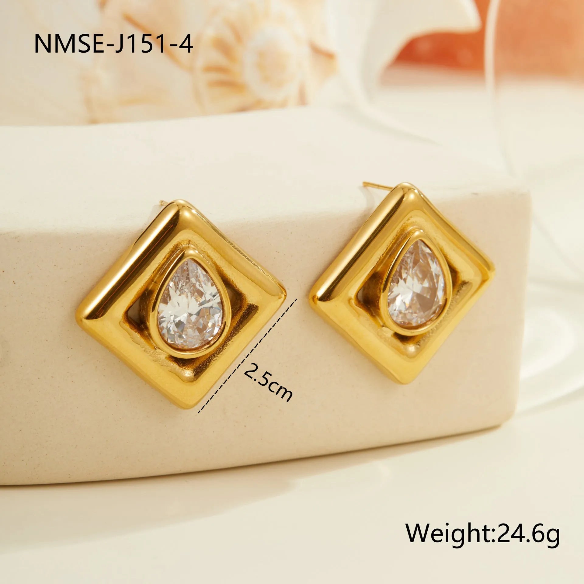 Gold geometric water drop design stud earrings with zircon accents on stainless steel