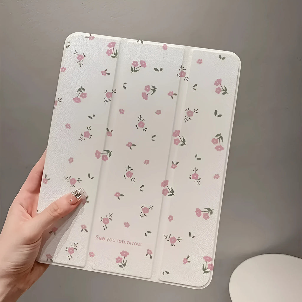 Transparent floral patterned iPad case showing three-fold magnetic stand positions