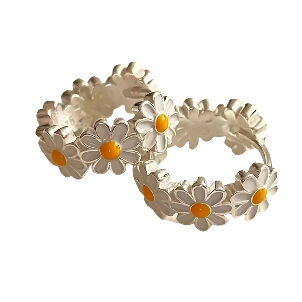 White daisy flower fashion ring earrings with electroplated finish and gemstone details.