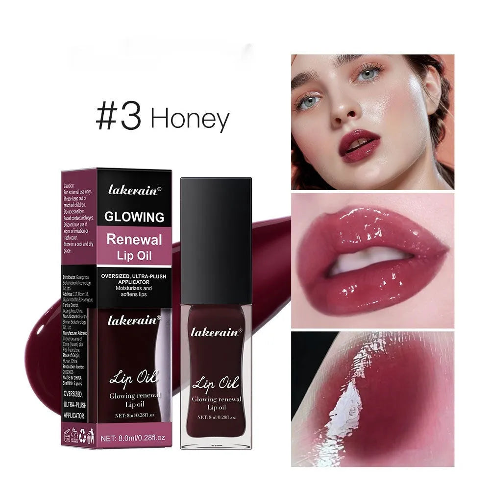 Lip gloss tube showing seven colour options including coral, honey, jam, pink, red, and rose variants