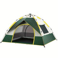 Dark green silver glue automatic quick-open camping tent for 3-4 people set up outdoors.
