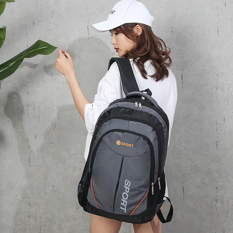 Men's large capacity nylon backpack in black with curved shoulder straps and letter design