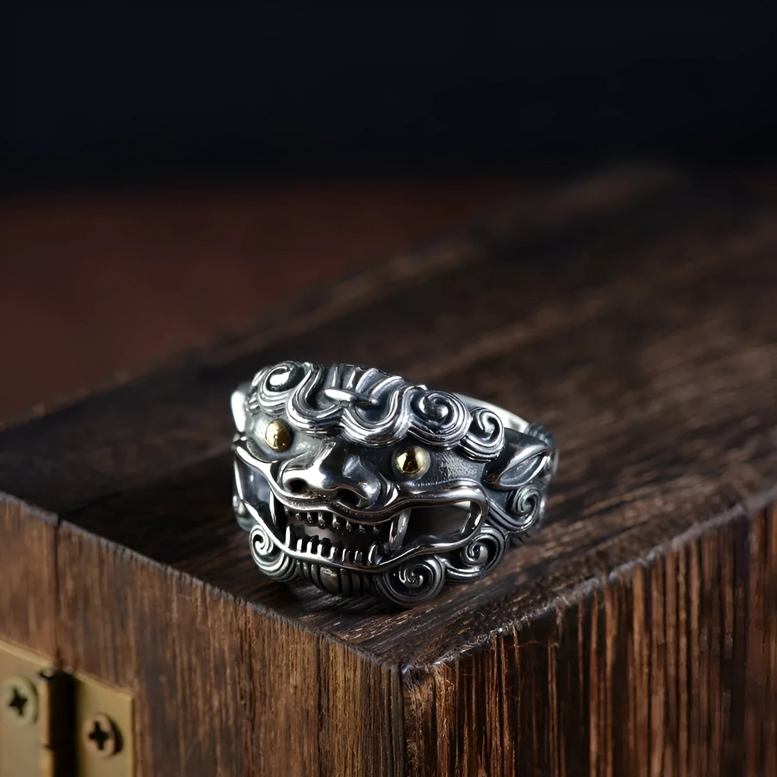 Silver open ring with a detailed Jibeast animal zodiac pattern and diamond design on a white background.