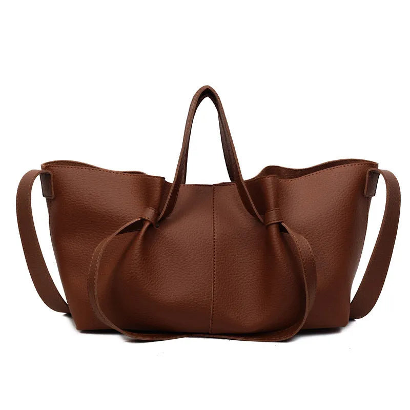 Large capacity one-shoulder crossbody bag in soft PU leather with sewing line detail, black colour option