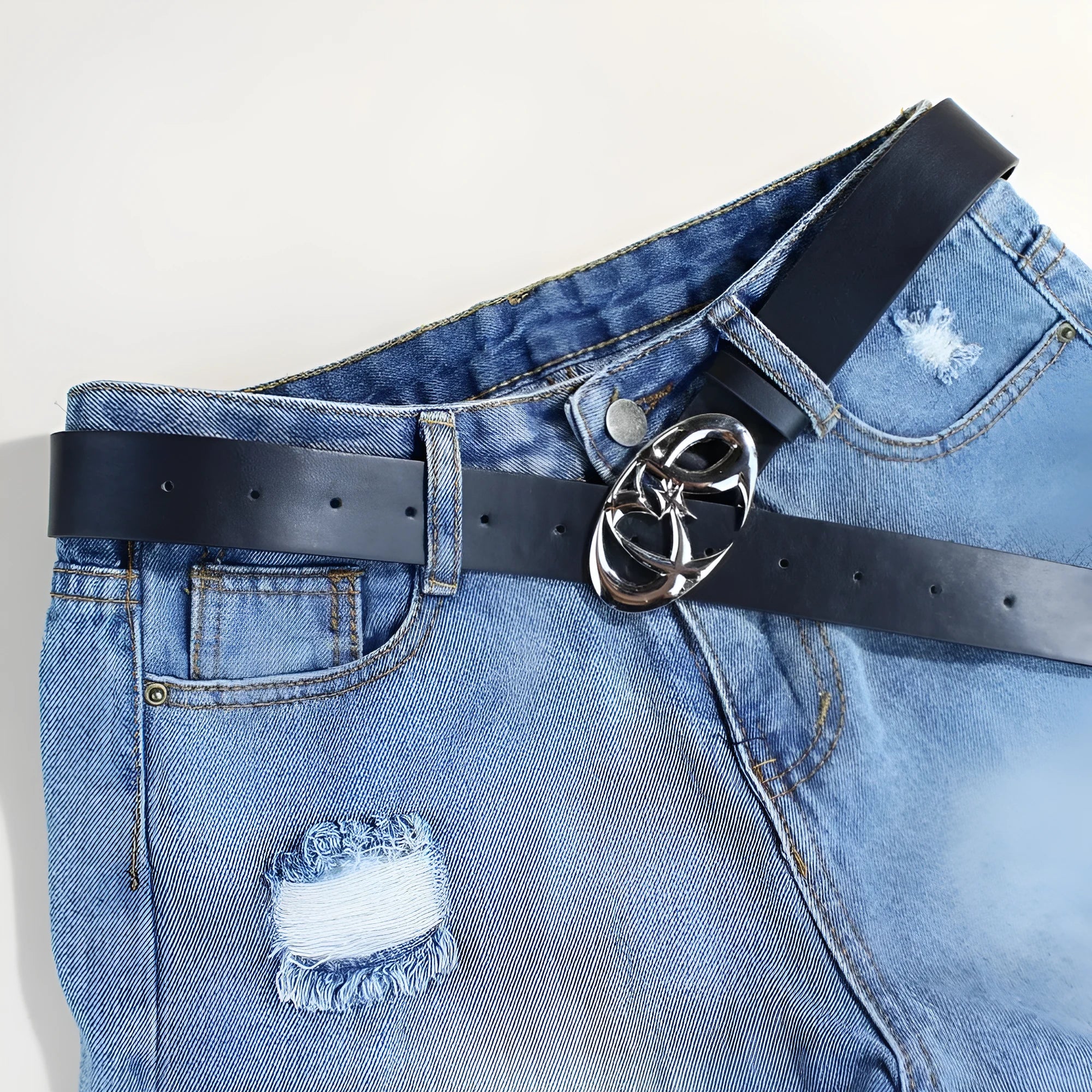 PU leather casual belt with silver alloy buckle showing snap button fastening mechanism