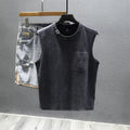 Women's solid black cotton sleeveless t-shirt with a loose fit and straight hem.