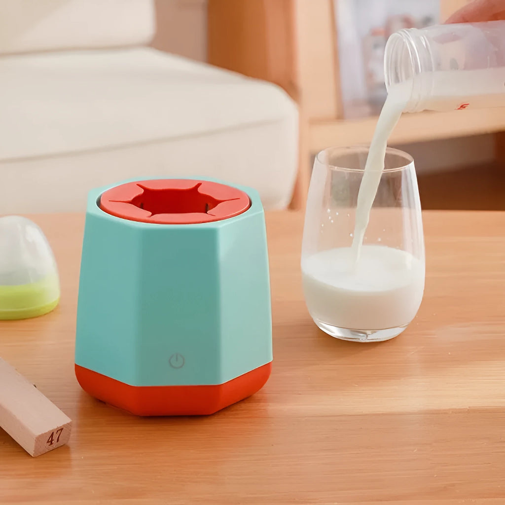 White baby electric milk shaker with silicone slot holding a baby bottle on a table, 110x110x110mm size
