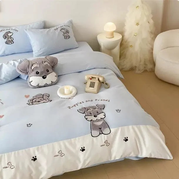 Schnauzer dog cartoon pattern embroidered on a complete thickened cotton bedding set showing quilt cover and pillowcases.