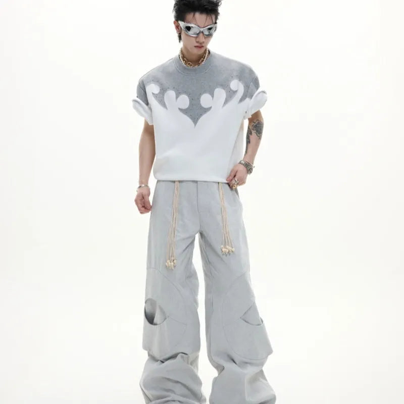 Grey loose-fit men's cotton shirt with short sleeves, drop shoulders, and a detailed burnt flower stitch pattern on the chest.
