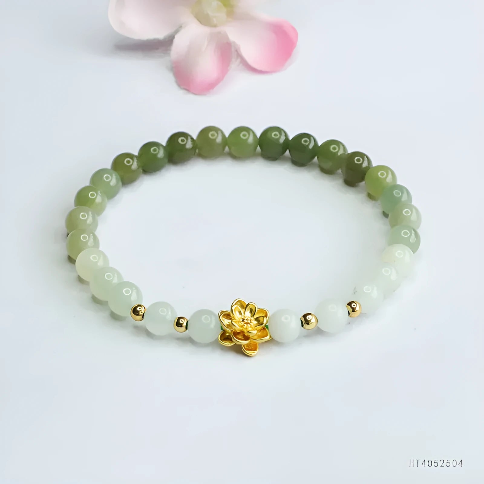 Ancient style jade bracelet with clear water gradient colour and lotus flower design
