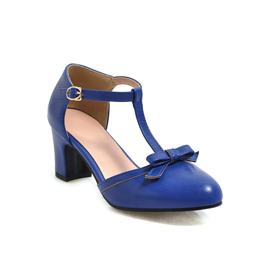 Women's platform sandals with chunky 6.5cm heel, hollow-out pattern and decorative bow detail