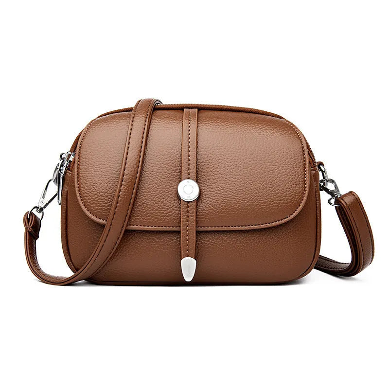 City Simple women's oval crossbody shoulder bag in soft PU leather